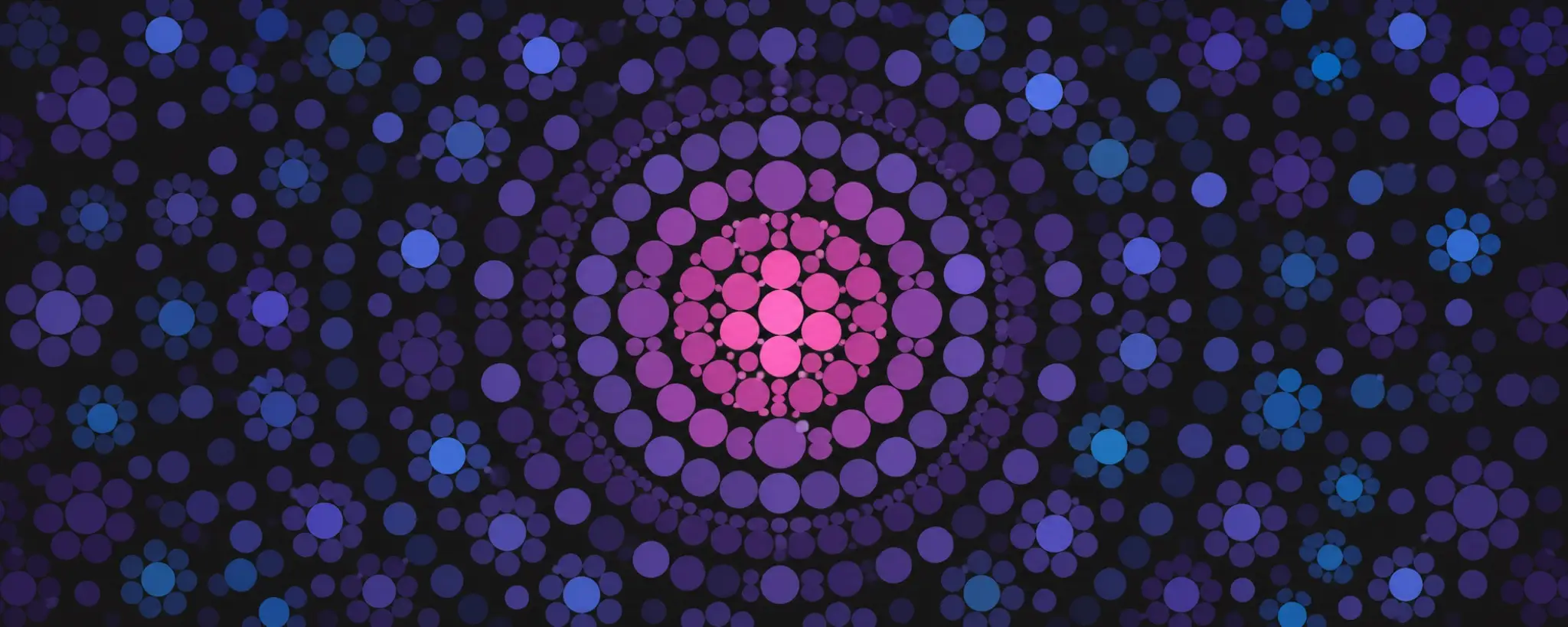 Dozens of blue and violet circle clusters surrounding a bright pink center and concentric quorum rings.